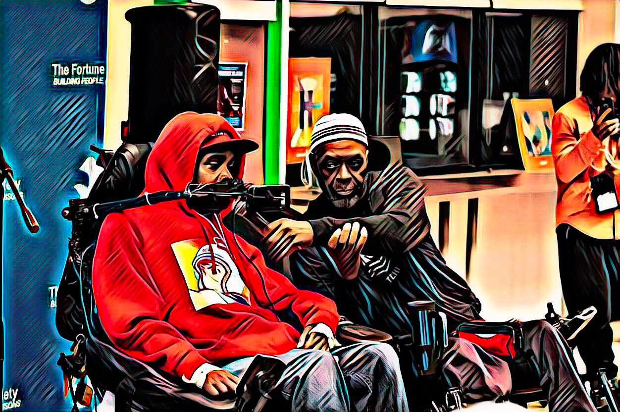 Digitally-altered photograph with highly saturated colors of Lavar Lawrence reading a poem with the assistance of a friend, who holds the microphone up to the poet's mouth.